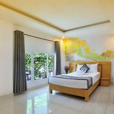 U And Me Hotel Tan Phong Kültér fotó